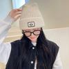 Autumn and winter new labeling cold hat versatile smiley face wool hat women's big head circumference ear protection warm hat thickened knitted hat