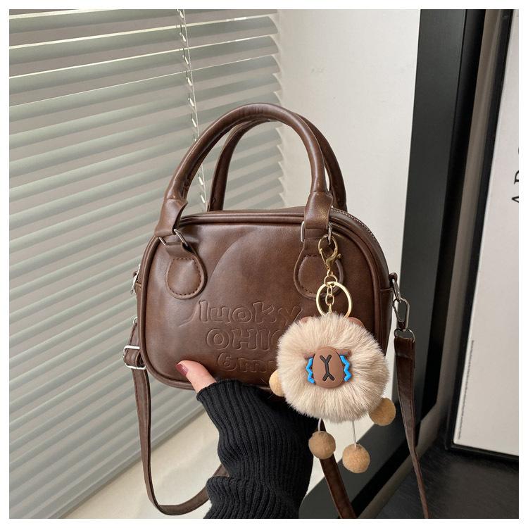 Ручная переноска боулинга в иностранном стиле женская 2025 весна новая ретро мода сумка на плечо простая повседневная сумка-мессенджер No pendant