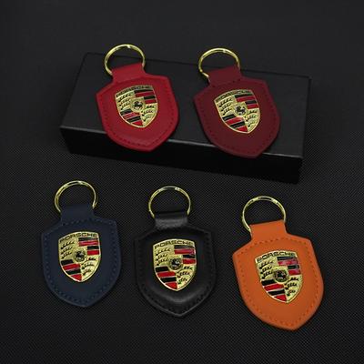 Auto Leder Schlüsselanhänger Schild Typ 3D Emblem Schlüsselanhänger Für Porsche Cayenne Taycan 911 718 Panamera Macan Carrera-GT 928 944 968 944