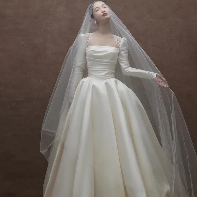 Elegant Backless Satin Wedding Gown - Vintage French-Inspired Long Sleeve Dress