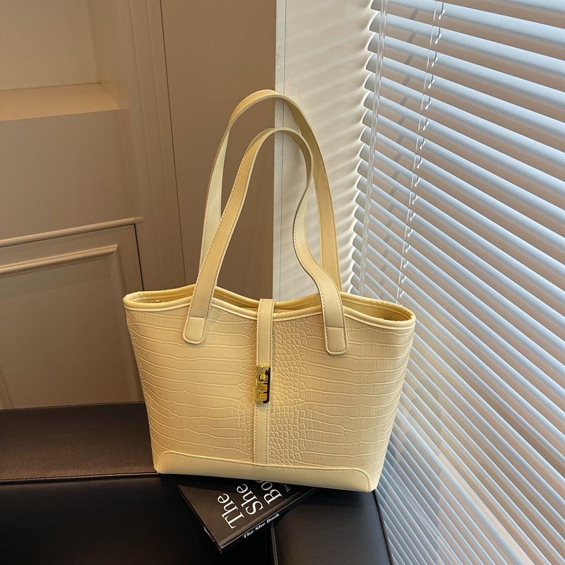 

New spring and summer commuter large-capacity bag women s fashion versatile shoulder bag casual tote bag жёлтый