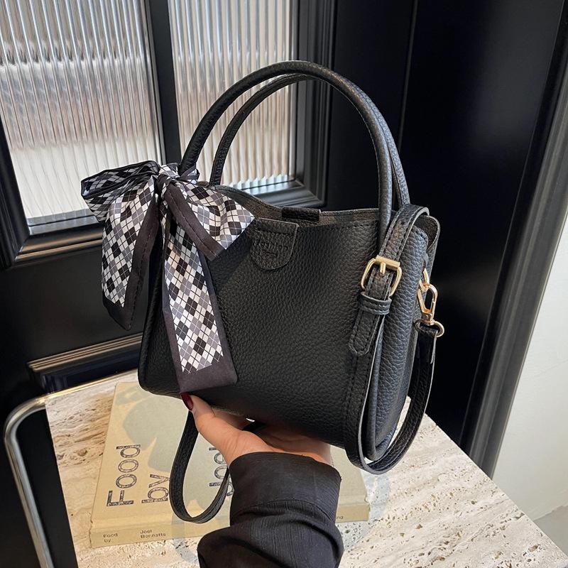 High-end small bag women's new trendy and versatile messenger bag casual bow lychee pattern portable mother bucket bag