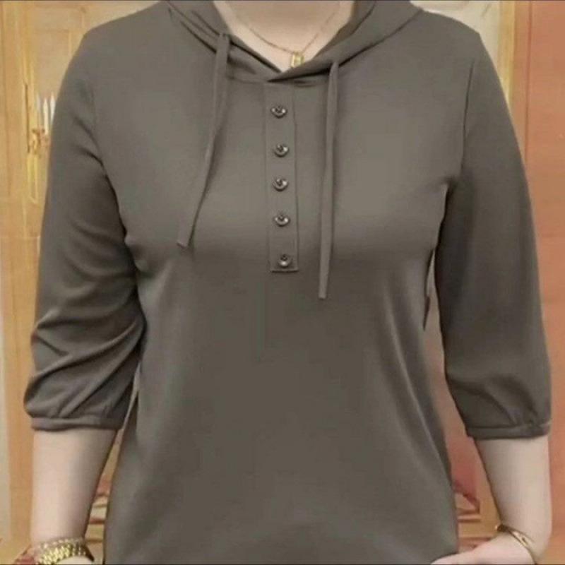 Chic Age-Defying Hooded Women's Spring Top - Loose Fit, Elastic, Versatile, Seven-Sleeve Design.