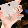 Fashion Geometric Bow Flower Pearl Earrings Women'S Premium Versatile Small Fragrant Wind Earrings