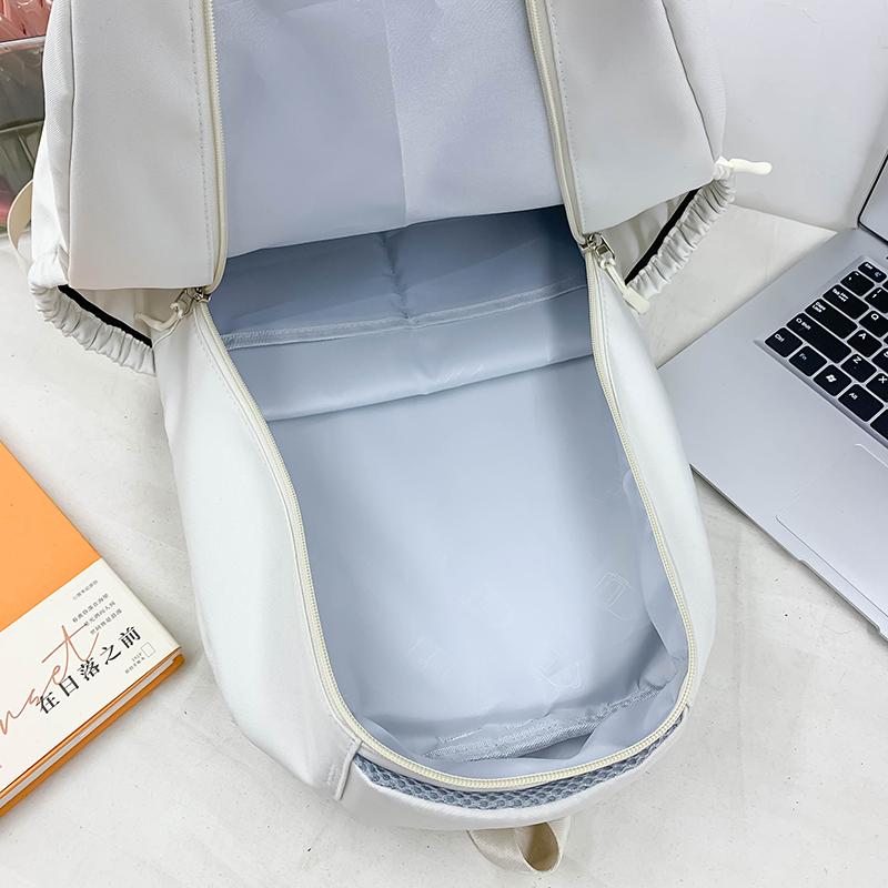 Weiblicher Rucksack mit großer Kapazität, einfarbig, Brief, Schüler, Schulranzen, männlicher Outdoor-Rucksack