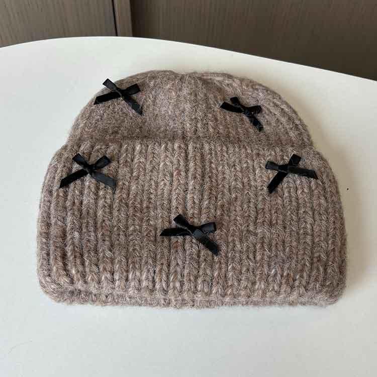 Wool hat women's autumn and winter new bow knitted hat shows a small face, warm ears, bag head, all-match cold hat