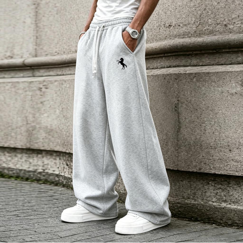 Loose-fitting men's straight-leg sweatpants with a drawstring waist feature convenient pockets, perfect for both home and on-the-go