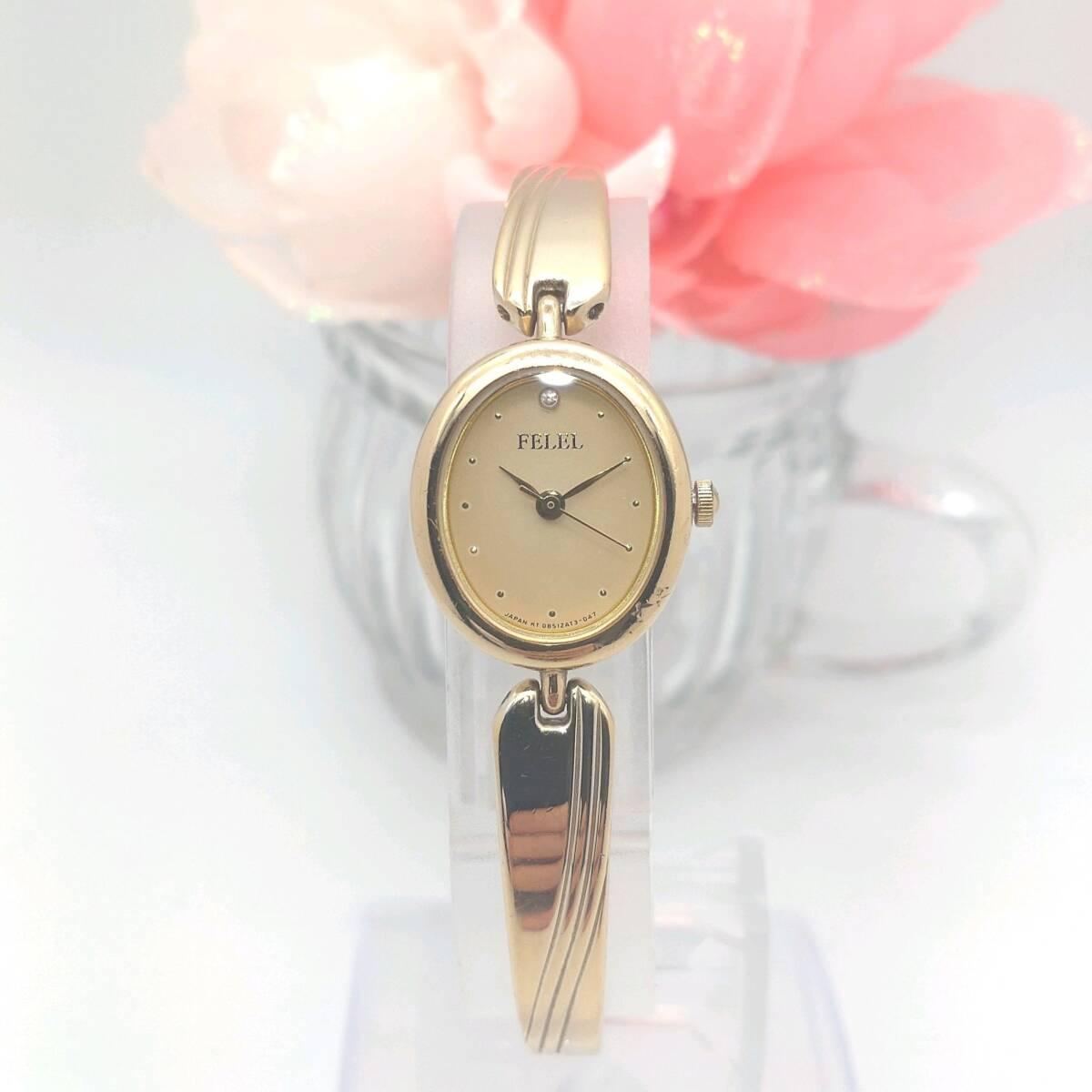 [Working item] FELELORIENTOrientQuartz watchLadiesOvalGoldManagement 838b