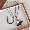 Chinese Vintage Charm: Brown Wooden Pendant Necklace for Women – High-End, Niche Clavicle Chain, Long Summer Style