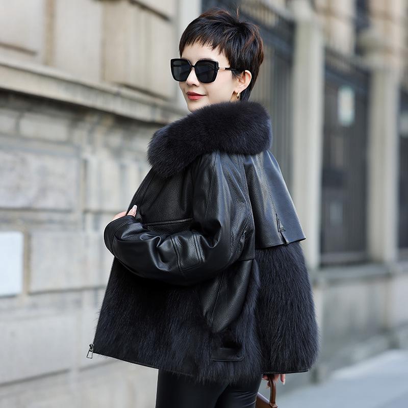 

Женский короткий пуховик из натуральной кожи и лисьего меха - Зимняя коллекция 2025. XXL 70-75 kg чёрный