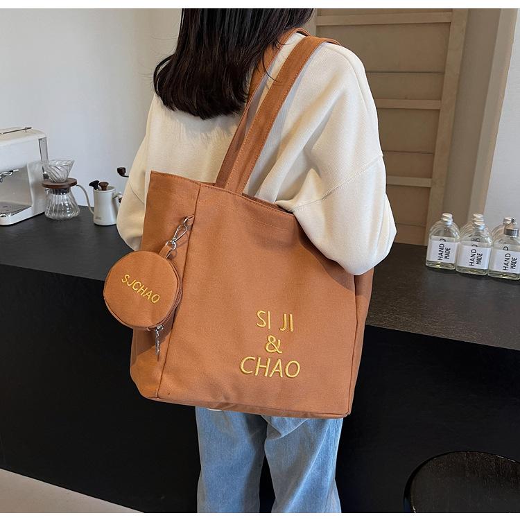 Women's Large-capacity Canvas Bag, Simple Letters, Versatile Commuting Artifact.