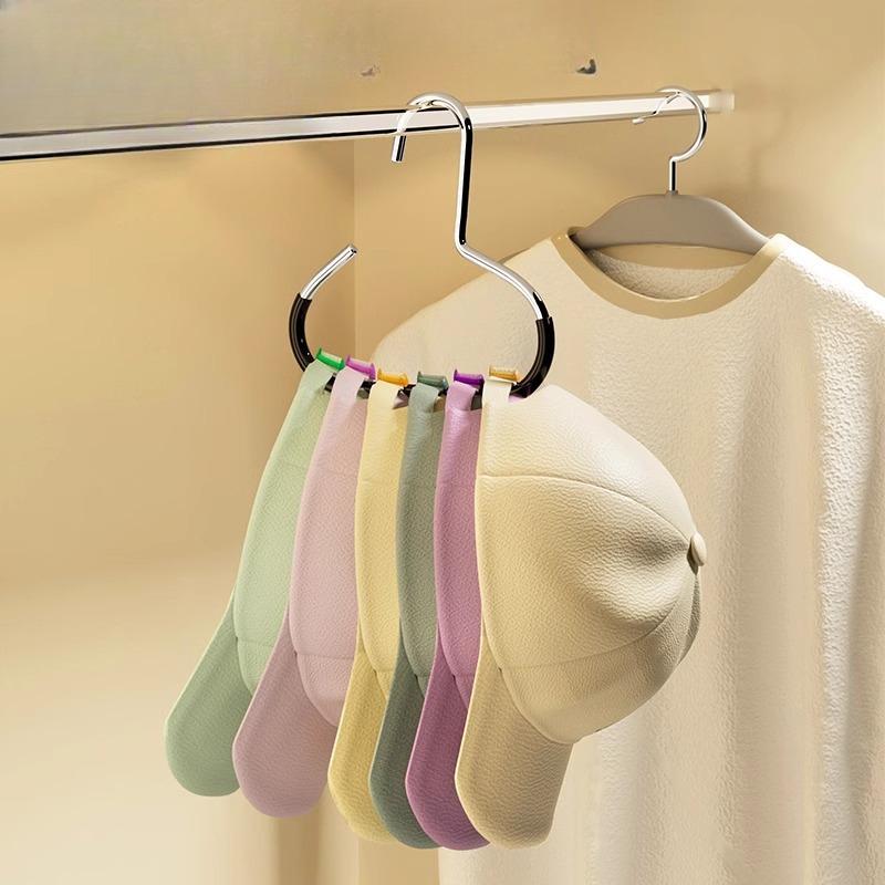 

Круглая вешалка — незаменимая вещь для хранения шляп, шелковых шарфов и платков, а также для развешивания ремней, предотвращая их соскальзывание. 1pc чёрный