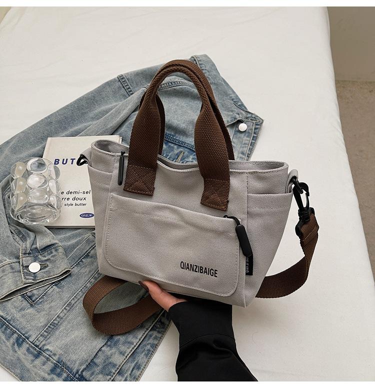 Stylish solid color simple commuter shoulder bag spring new niche casual lightweight messenger bag