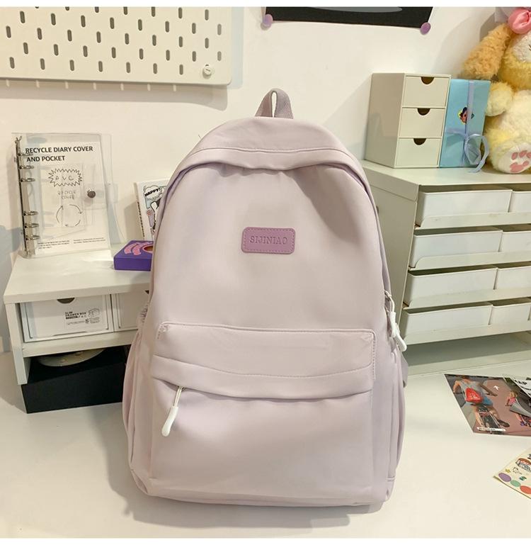 Schoolbag Japanese simple backpack large capacity high sense casual backpack male multi-function solid color female college student schoolbag tide