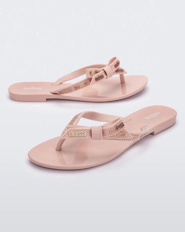 

2025 Женские шлепанцы Melissa с бантом - Простые, Модные, Летние пляжные туфли на плоской подошве EUR 39 светло-розовый