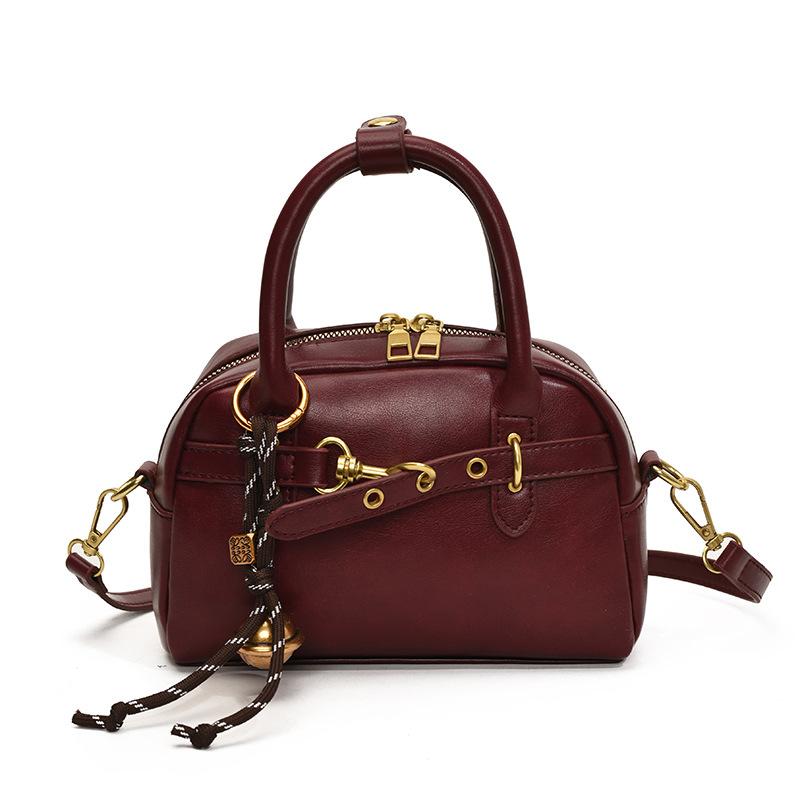 Wholesale New Design High Sense Fashion Niche Design Sense Portable Boston Bag Solid Color Versatile Messenger Women's Bag