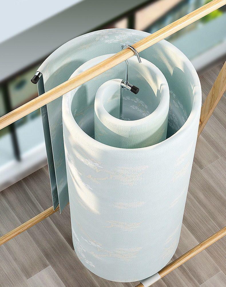 Rotatable Spiral Sun Bed Sheet and Quilt Drying Rack: Foldable and Cool Hanging Solution