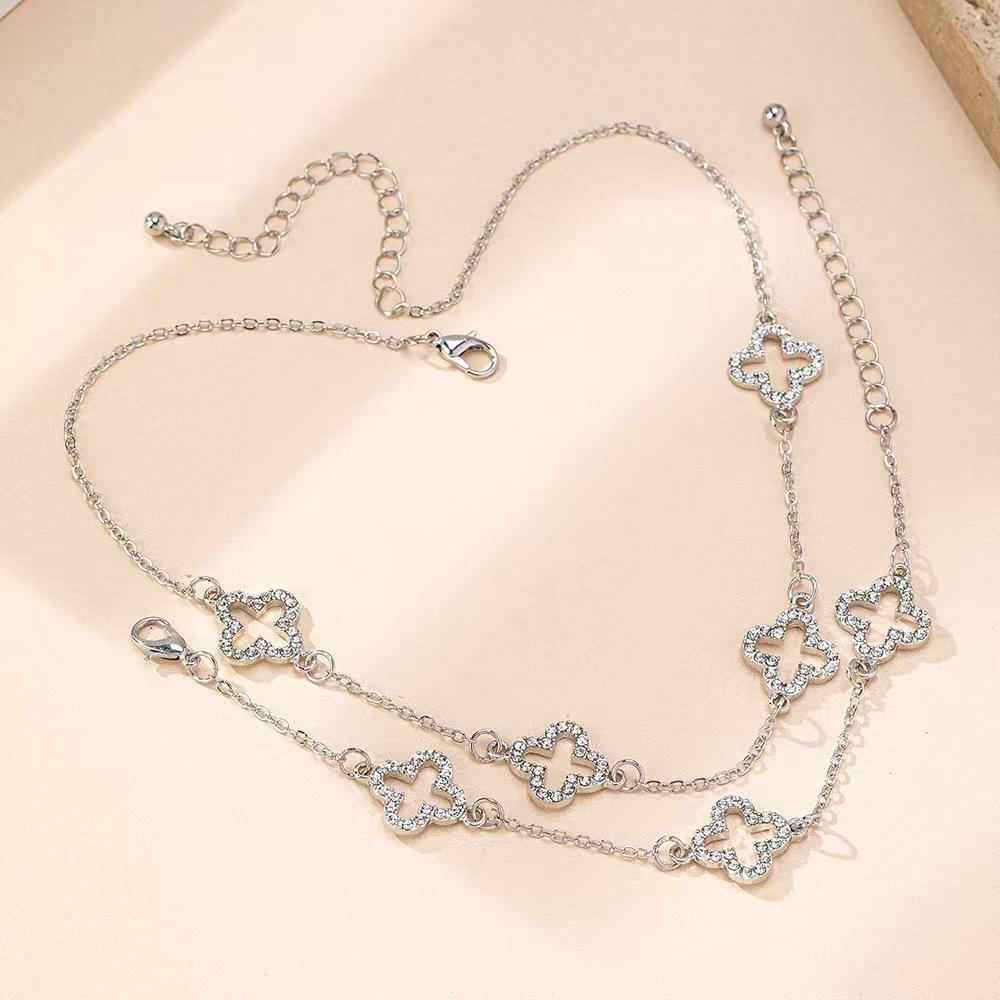 Versatile inlaid hollow four-leaf clover shape necklace bracelet jewelry set