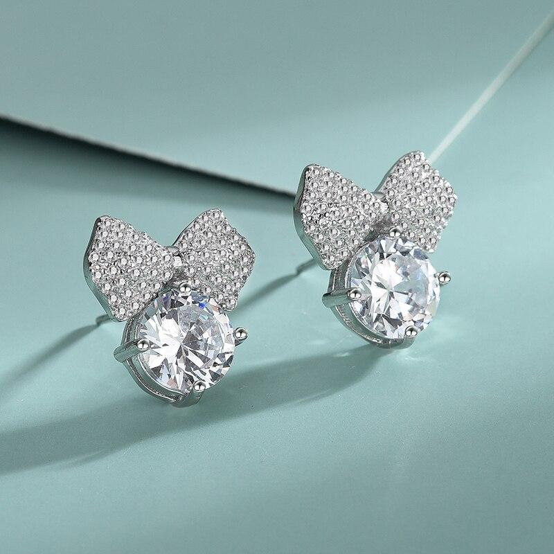 Selling Japanese ,Korean ,European American Personality Adorable Bow Zirconia Sterling Tone Earrings Trendy Stylish FemalePersonality