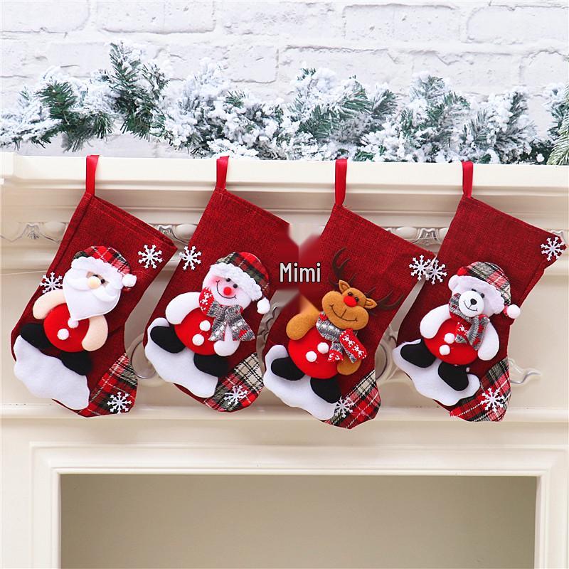 Sacchetto regalo calza di Natale media con decorazione di Babbo Natale e Pupazzo di Neve