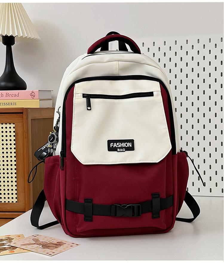 

Tide large-capacity backpack male junior high school college student schoolbag female contrasting color college student computer travel backpack червоний