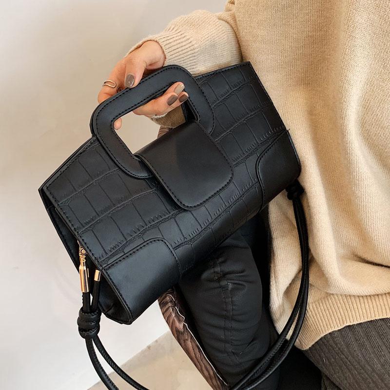 Elegante tekstur damevesker allsidige skulder-crossbody-vesker feminine jobb- og crossbody-pendel-vesker monokrome og retro nye