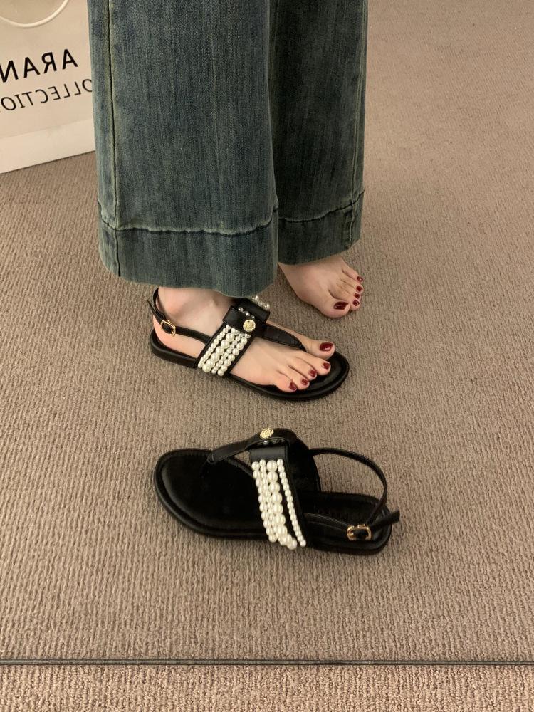 

French small fragrant wind pearl word with toe sandals female summer 2025 new fairy flat beach shoes 40