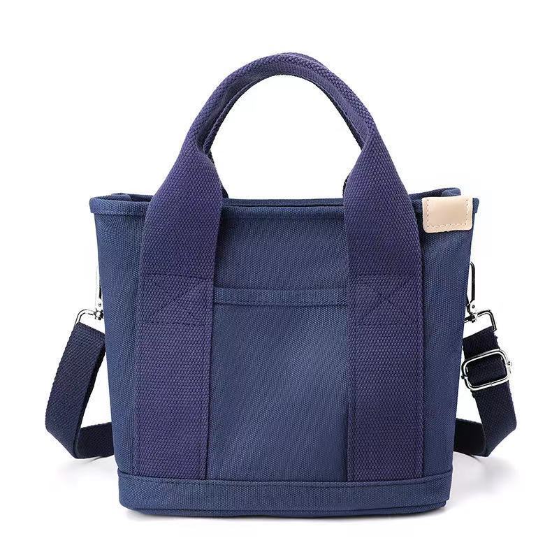 Canvas bag Portable messenger bento bag Large capacity bag Fashion trend One shoulder messenger women's bag