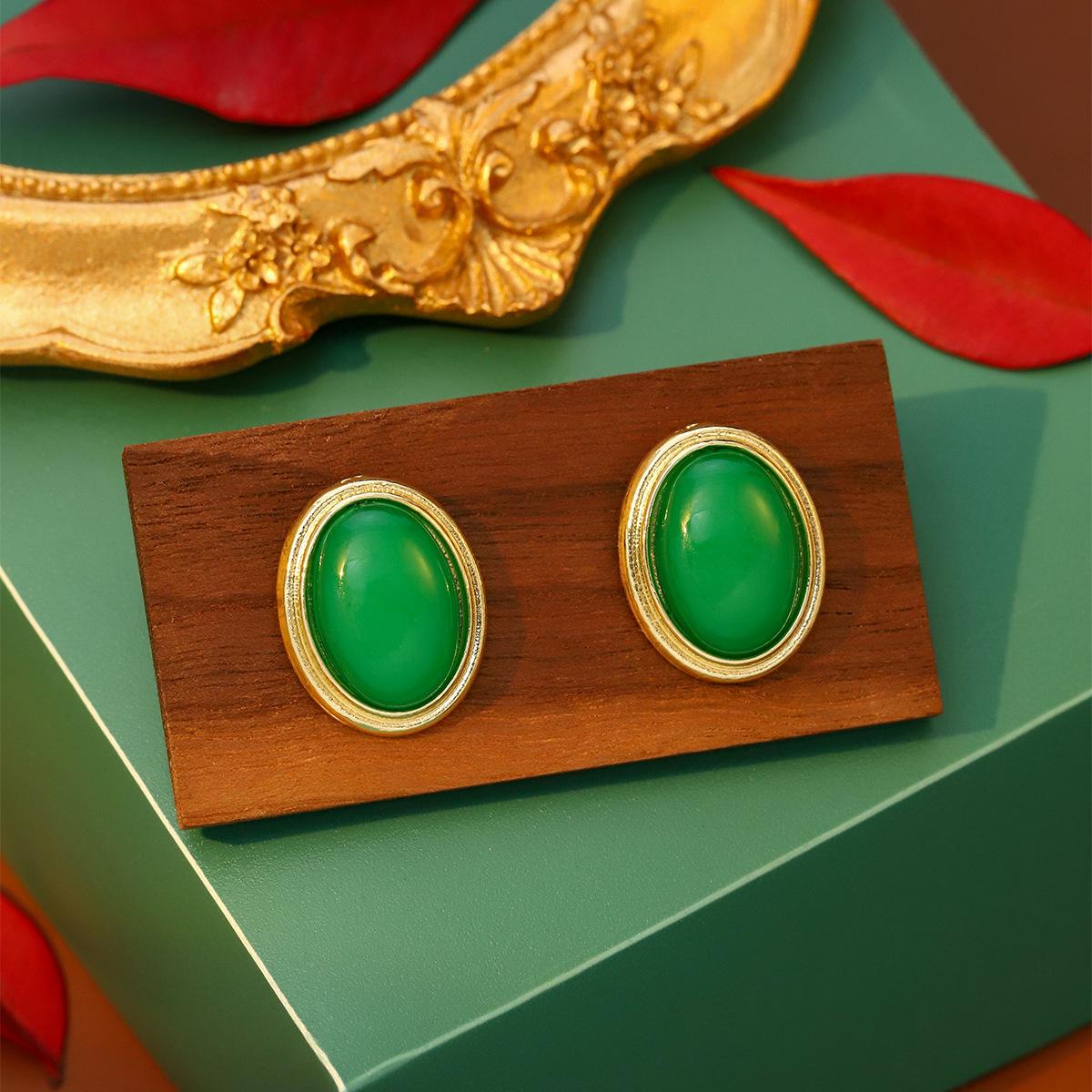 Emerald Geometric Oval Earrings with Rhinestone-Inlaid Butterfly Design