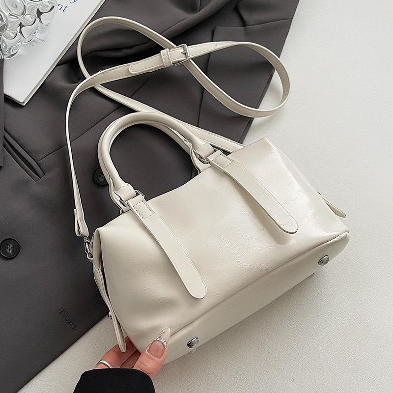 Korean Trend Gentle Cream Style Simple Portable Soft Leather Pillow Bag Women's Fashion Versatile Casual Commuter Messenger Bag