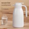 Press-Type Thermos Flask: Compact Glass-Lined Water Bottle with Hour-Long Insulation, Convenient Home Delivery.