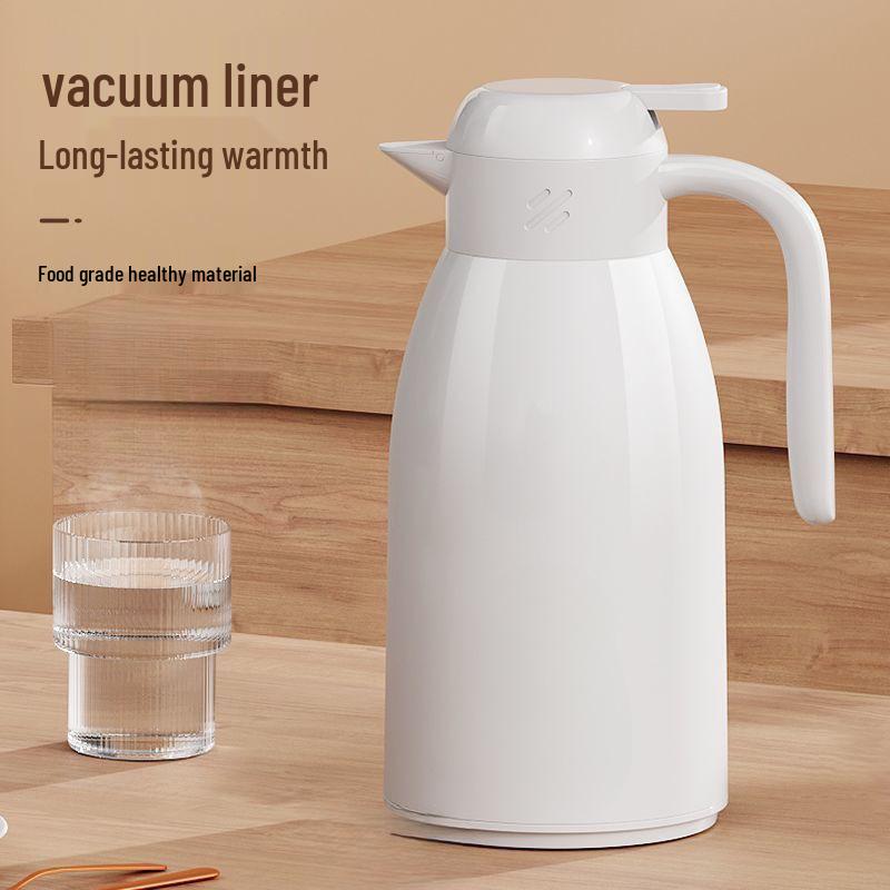 Press-Type Thermos Flask: Compact Glass-Lined Water Bottle with Hour-Long Insulation, Convenient Home Delivery.