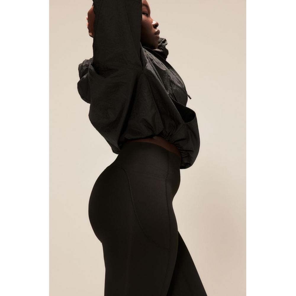 

Спортивные тайтсы с карманами HM ShapeMove, черные