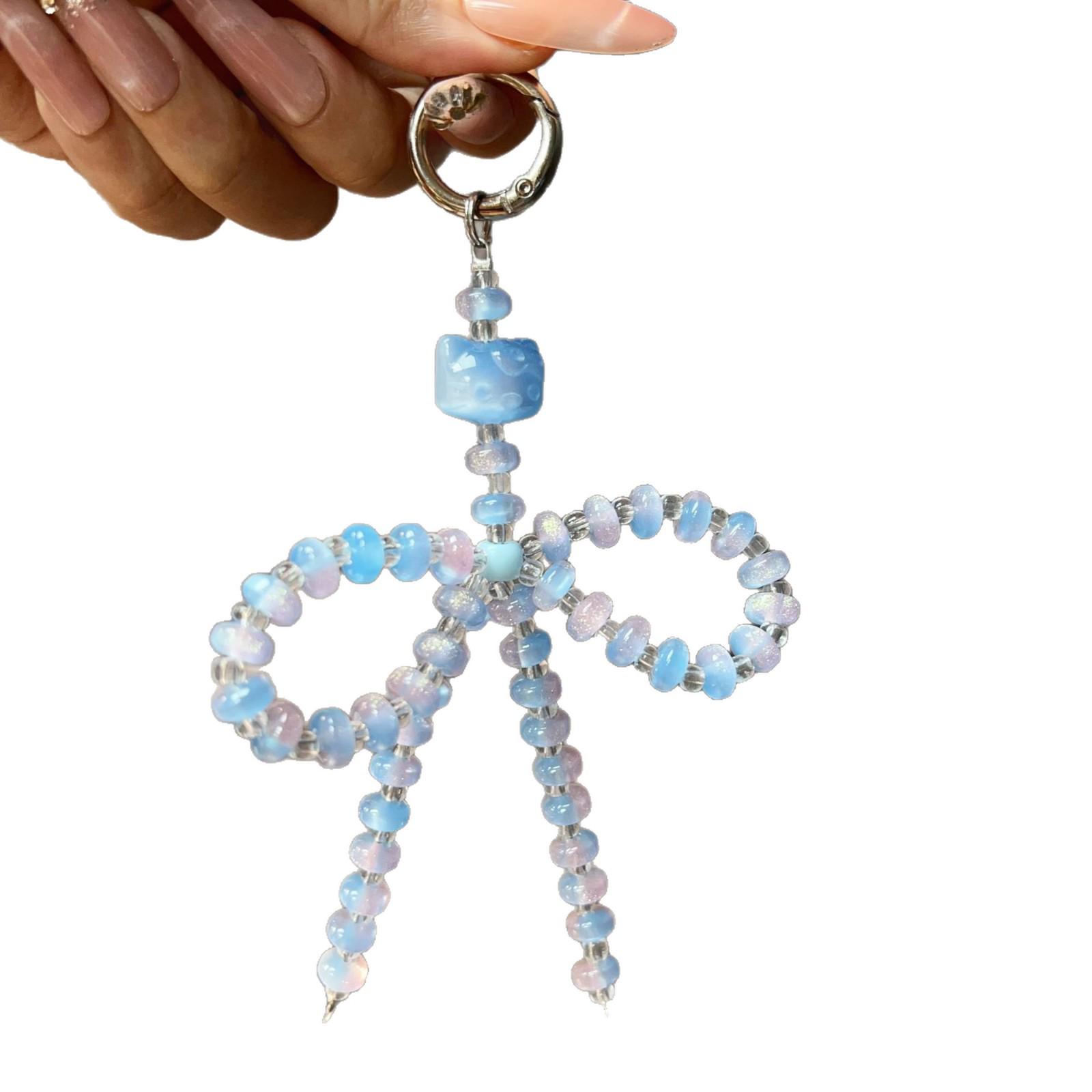 Creative Acrylic Beaded Bow Phone Charm with Star and Pearl Ornaments White