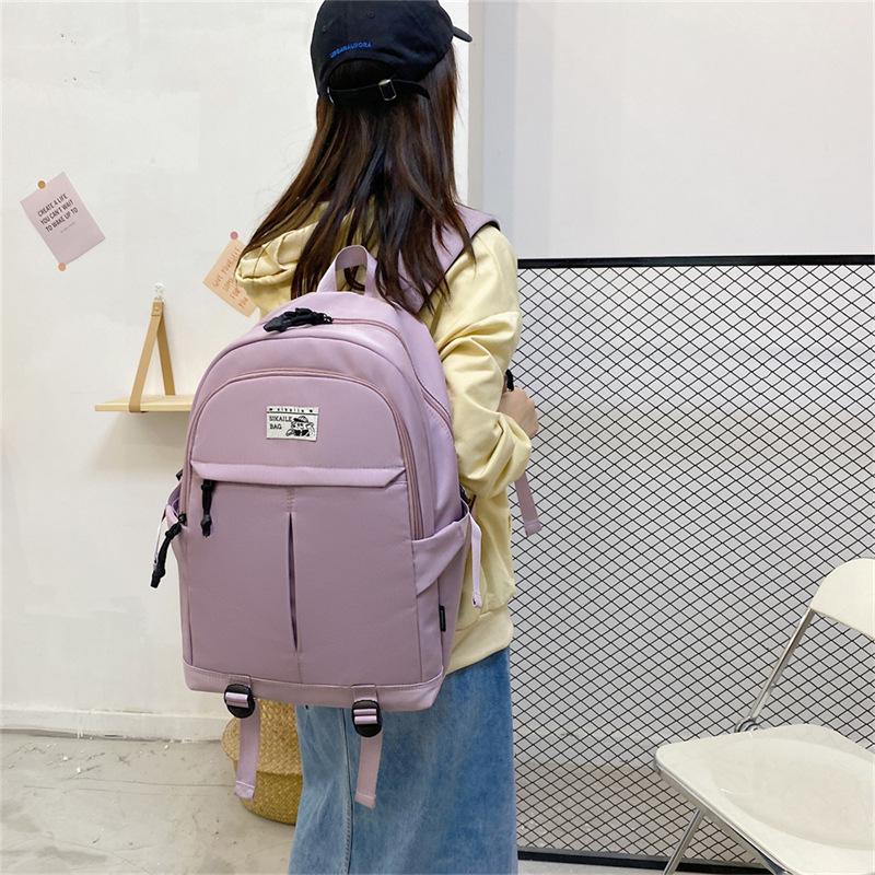 Modny plecak w stylu koreańskim z casualowym napisem