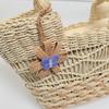 Handwoven Natural Fiber Tote Bag with Braided Handles and Open Weave Design