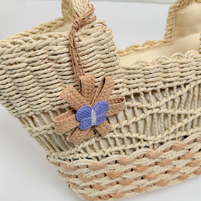 Handwoven Natural Fiber Tote Bag with Braided Handles and Open Weave Design