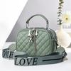 Women's bag bag fashion rhombus hand bag bear pendant fringed three-layer versatile messenger shoulder bag bags