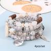 Bohemian Beaded Bracelet Set, Women's Stackable Stretch Bracelets with Tassel & Wing Charm