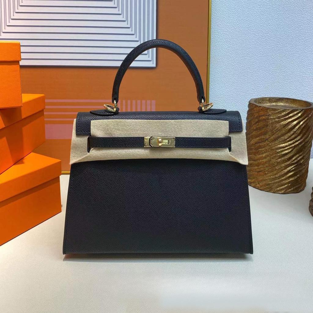 Grenzüberschreitende Hersteller Großhandel Damenhandtaschen 2023 neue Handtaschen aus Leder mit Palmenmuster tragbare Schulter-Umhängetaschen Damenhandtaschen große Kapazität