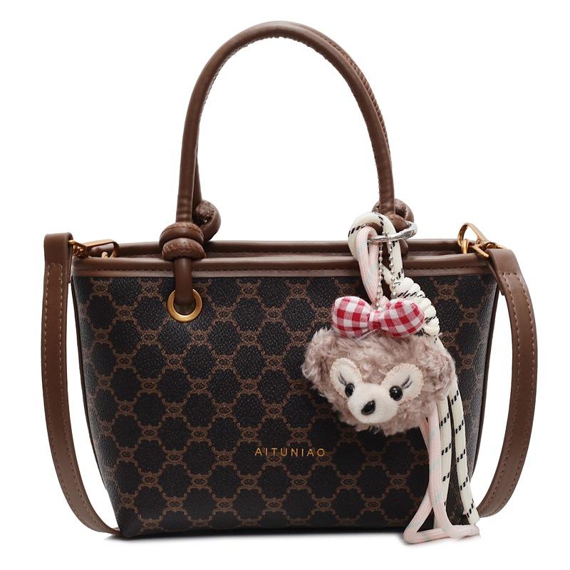 Retro portable small bag women's spring new popular versatile shoulder messenger bag commuter bucket bag