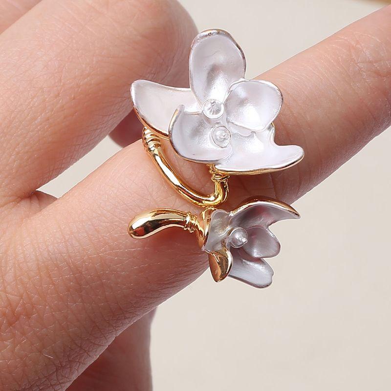 

European and American Horseshoe Lily Retro Metal Bracelet Flower Opening High-Grade Light Luxury Niche Bracelet Spray Paint Hand Jewelry Ring