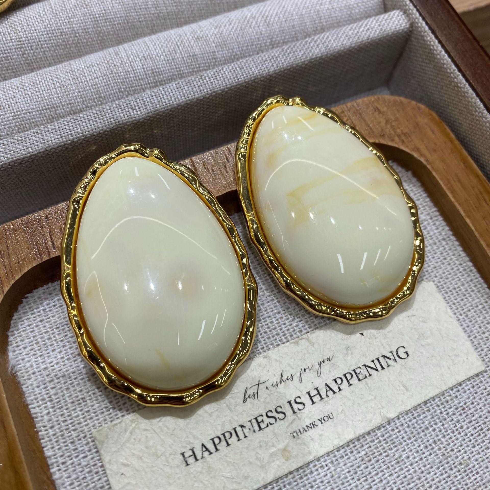 

2026 Poplar Forest Milky White Water Drop Earrings Matte Engraved Edge Exaggerated Stud Earrings Resin High-End Women