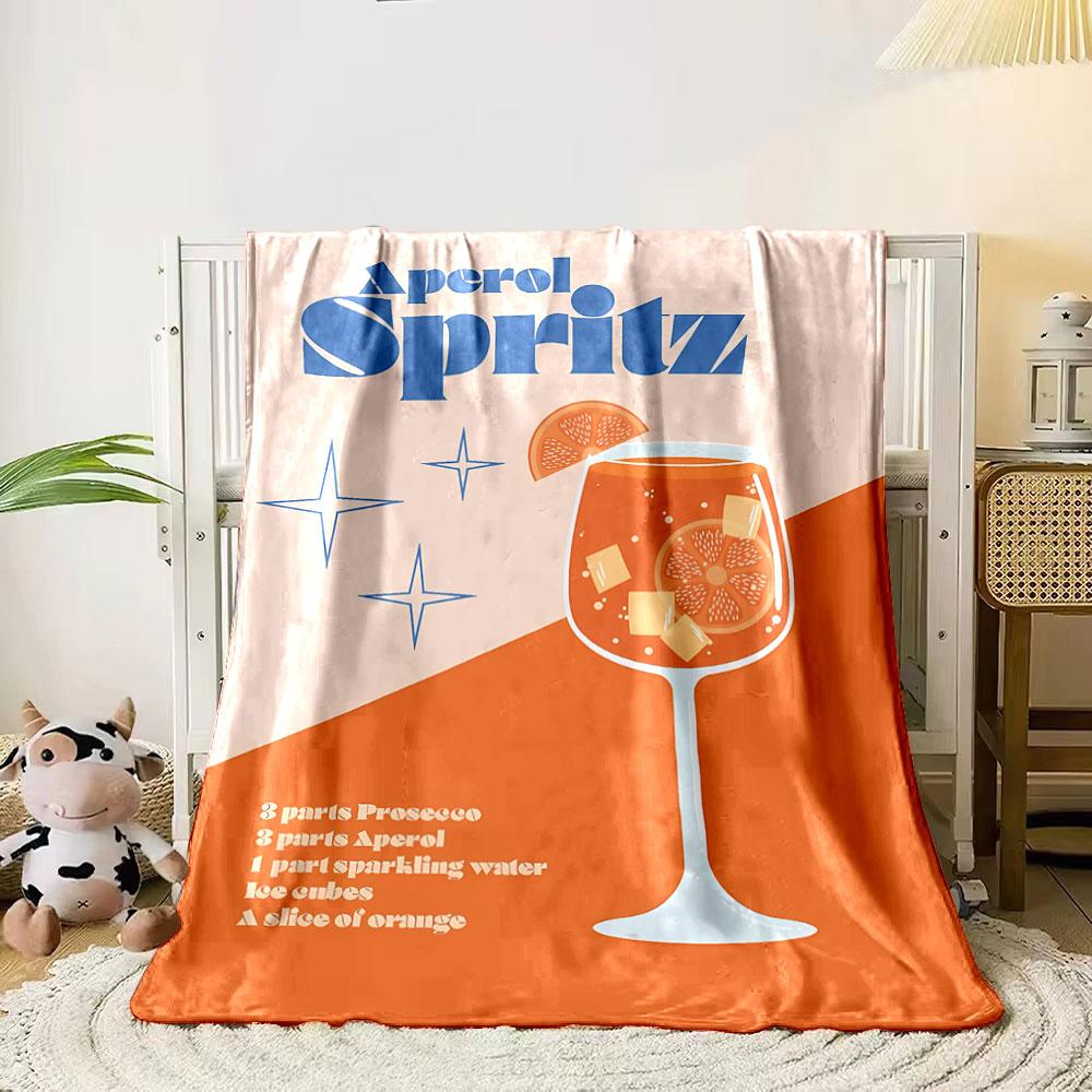 A vibrant Aperol Spritz cocktail in a glass with orange slices and ice. for all seasons blanket lunch break throw gift 80cm x 120cm