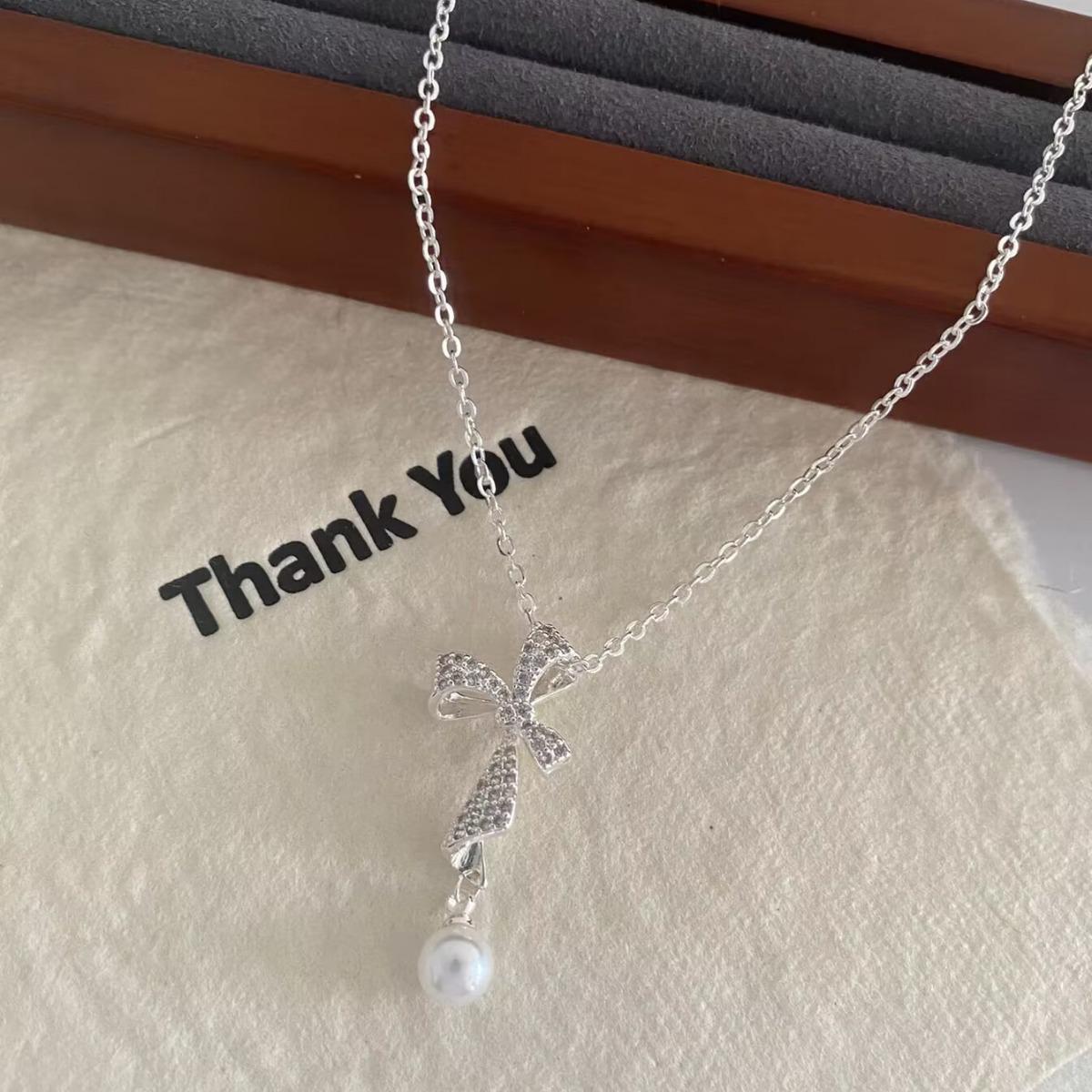 Elegant French Zircon Bow Pearl Choker Necklace for Women - Luxury Versatile Collarbone Chain