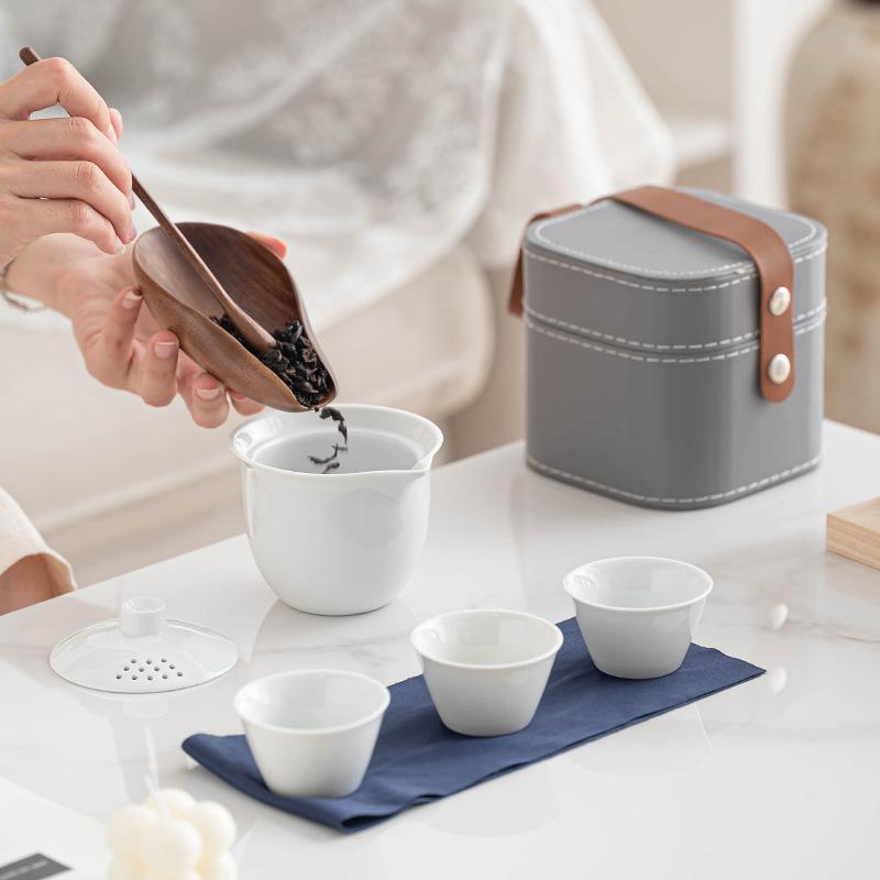 

Suya travel tea set Outdoor portable tea set Kuaike cup One pot Three cups Business gifts