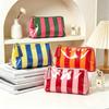 Striped PVC Makeup Bag with Tassel Zipper – Waterproof, Portable Cosmetic and Toiletry Storage
