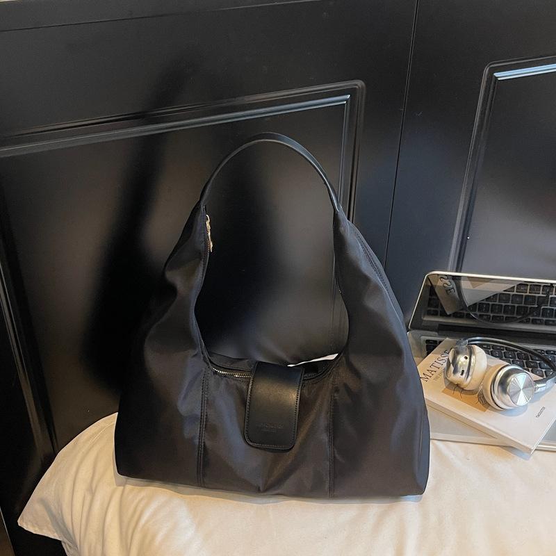 Hochwertige einseitige Achseltasche Damen Retro-Textur Große Kapazität Damen-Tasche Nischen-Tragetasche