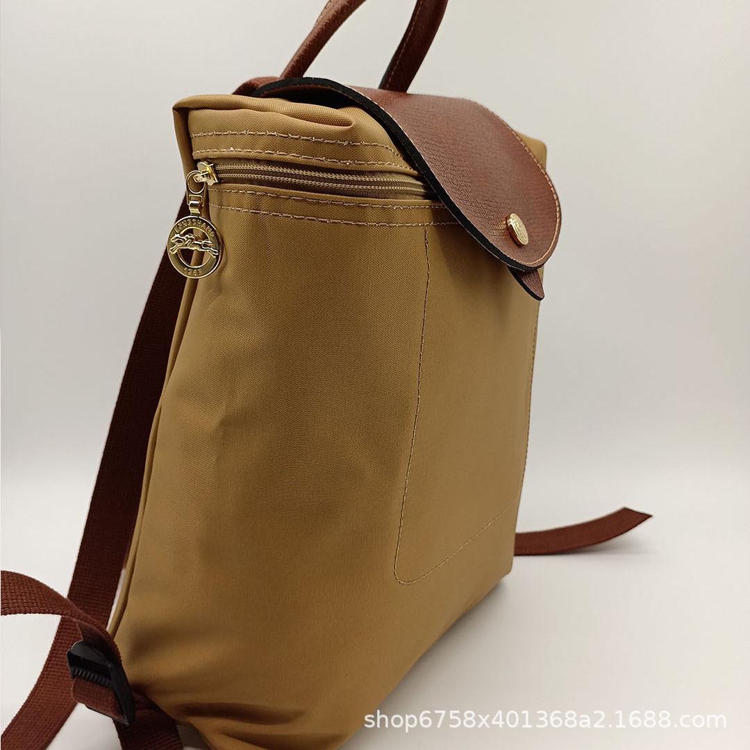 

Жіноча легка водонепроникна нейлонова сумка кросбоді класичного стилю 2025