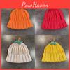 Trendy Pumpkin Knit Hat With Decorative Flowers And High Crown For Women Winter Wear